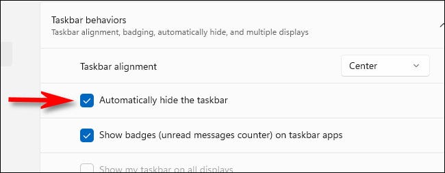 En Comportamientos de la barra de tareas, marque "Ocultar automáticamente la barra de tareas."
